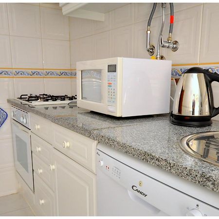 Apartamentos Capitolina Quarteira Exteriör bild