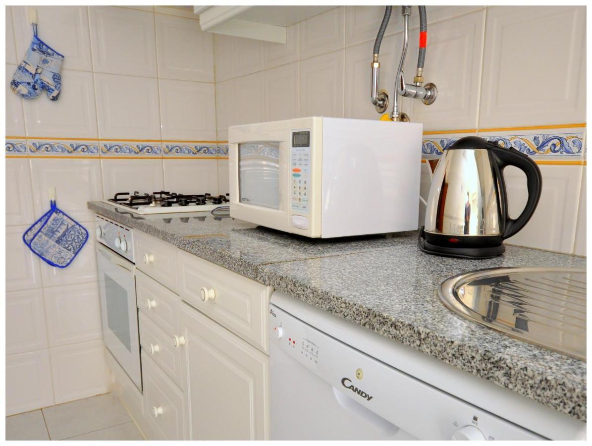 Apartamentos Capitolina Quarteira Exteriör bild