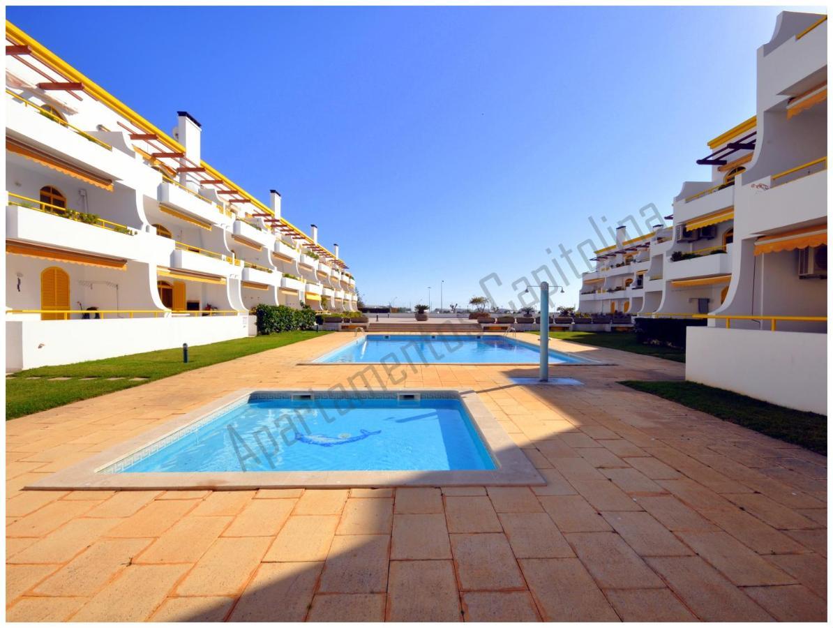 Apartamentos Capitolina Quarteira Exteriör bild